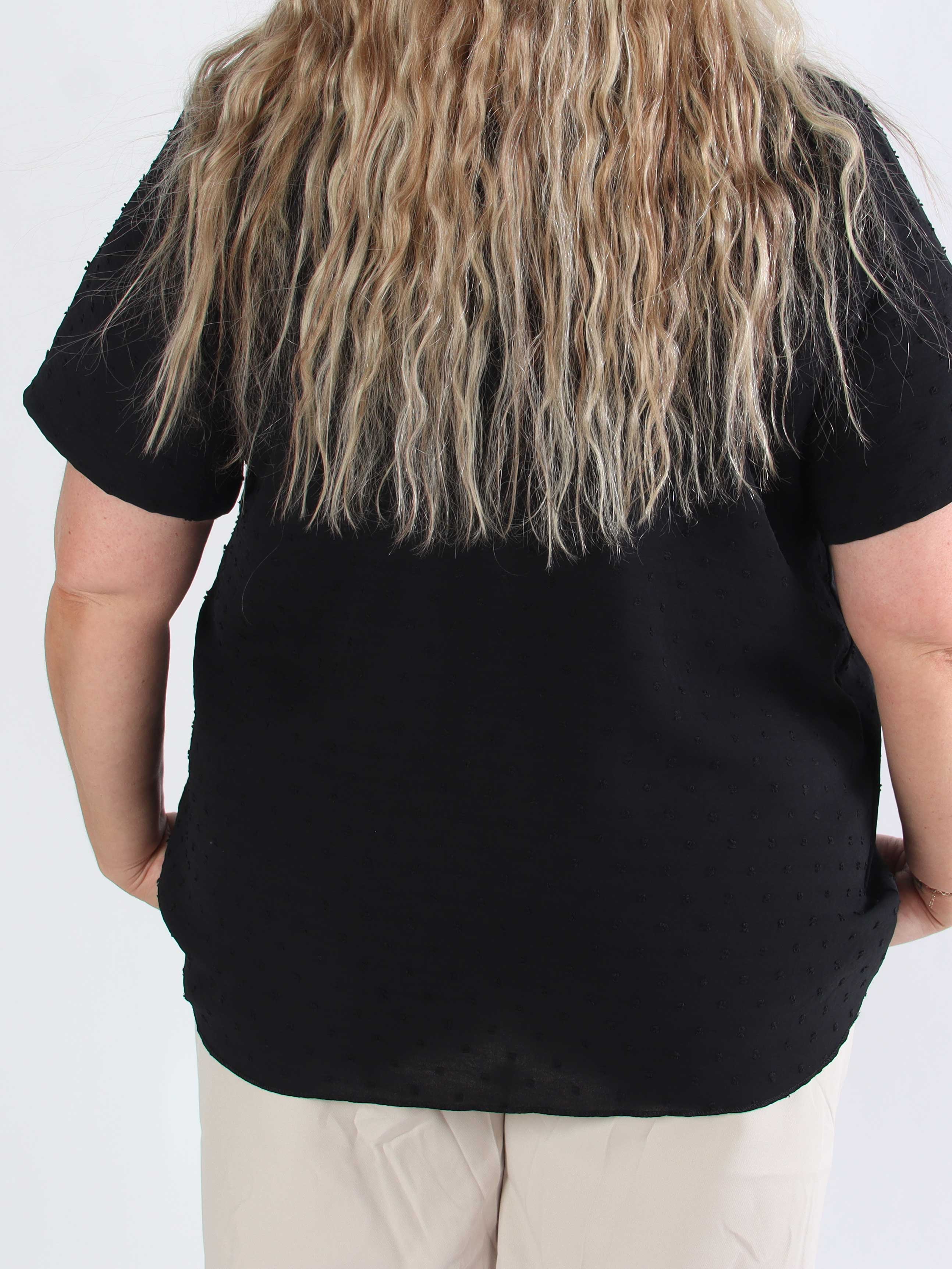 Bloom - Söt tunika i plusstorlek med volangkant och rosett